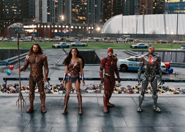 This image released by Warner Bros. Pictures shows Jason Momoa, from left, Gal Gadot, Ezra Miller and Ray Fisher in a scene from Justice League. (AP) This image released by Warner Bros. Pictures shows Jason Momoa, from left, Gal Gadot, Ezra Miller and Ray Fisher in a scene from Justice League. (AP)