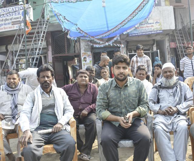 Mohammad Arif (in green shirt) is the second of four brothers and has completed his BBA from Noida. He is also the youngest of the nine candidates contesting from Maharajpur ward. (Sakib Ali/HT Photo) Mohammad Arif (in green shirt) is the second of four brothers and has completed his BBA from Noida. He is also the youngest of the nine candidates contesting from Maharajpur ward. (Sakib Ali/HT Photo)