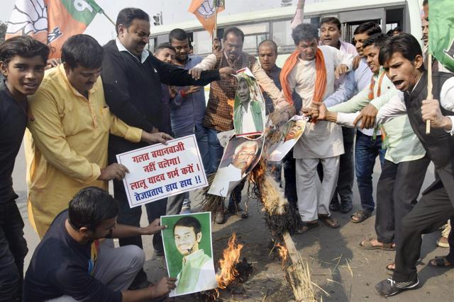 BJP activists burning the effigy of RJD leader Tej Pratap Yadav during a protest his controversial remarks, in Patna on Thursday. (PTI) BJP activists burning the effigy of RJD leader Tej Pratap Yadav during a protest his controversial remarks, in Patna on Thursday. (PTI)