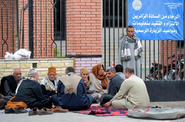Relatives of the victims of the bomb and gun assault on the North Sinai Rawda mosque wait outside the Suez Canal University hospital in the eastern port city of Ismailia on November 25, 2017, where they were taken to receive treatment following the deadly attack the day before. (AFP) Relatives of the victims of the bomb and gun assault on the North Sinai Rawda mosque wait outside the Suez Canal University hospital in the eastern port city of Ismailia on November 25, 2017, where they were taken to receive treatment following the deadly attack the day before. (AFP)