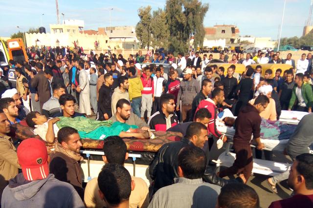 Egyptians carry victims on stretchers following a gun and bombing attack on the Rawda mosque near the North Sinai provincial capital of El-Arish on November 24, 2017. (AFP) Egyptians carry victims on stretchers following a gun and bombing attack on the Rawda mosque near the North Sinai provincial capital of El-Arish on November 24, 2017. (AFP)