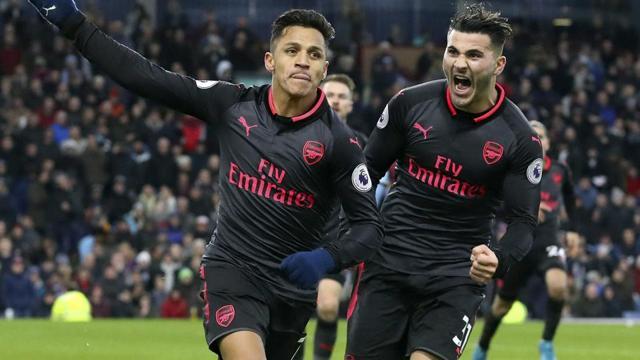 Arsenal's Alexis Sanchez celebrates scoring his side's first goal against Burnley. (AP) Arsenal's Alexis Sanchez celebrates scoring his side's first goal against Burnley. (AP)