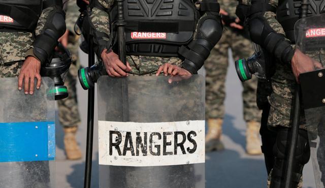 Rangers stand guard at a flashpoint with protesters near the Faizabad junction in Islamabad. (Reuters) Rangers stand guard at a flashpoint with protesters near the Faizabad junction in Islamabad. (Reuters)