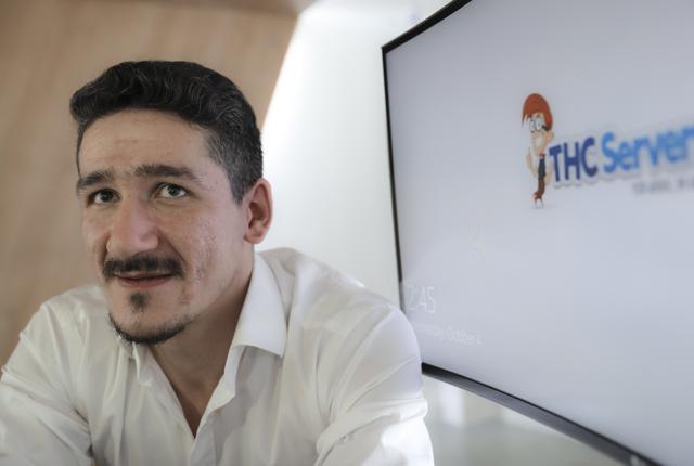 Catalin Florica, who launched THCServers.com in 2013, poses for a portrait during an interview at the company's headquarters, outside Craiova, southern Romania, Wednesday, Oct. 4, 2017. (AP) Catalin Florica, who launched THCServers.com in 2013, poses for a portrait during an interview at the company's headquarters, outside Craiova, southern Romania, Wednesday, Oct. 4, 2017. (AP)