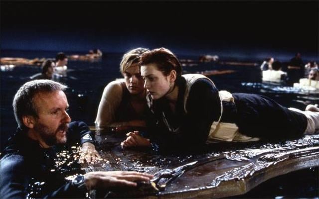 Leonardo DiCaprio and Kate Winslet with James Cameron while shooting for Titanic.