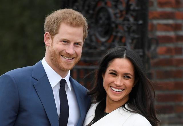 Britains Prince Harry poses with Meghan Markle in the Sunken Garden of Kensington Palace, London, Britain. (REUTERS) Britains Prince Harry poses with Meghan Markle in the Sunken Garden of Kensington Palace, London, Britain. (REUTERS)