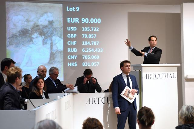 Auctioneer Matthieu Fournier (R) calls the sale at 90,000 euros for a pastel portrait depicting Camille Claudel's sister Louise. (AFP) Auctioneer Matthieu Fournier (R) calls the sale at 90,000 euros for a pastel portrait depicting Camille Claudel's sister Louise. (AFP)