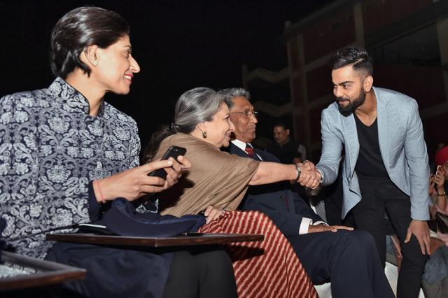 Virat Kohli greets Sharmila Tagore as Anjum Chopra looks on during the DDCA's 1st Annual Conclave 2017. (PTI) Virat Kohli greets Sharmila Tagore as Anjum Chopra looks on during the DDCA's 1st Annual Conclave 2017. (PTI)