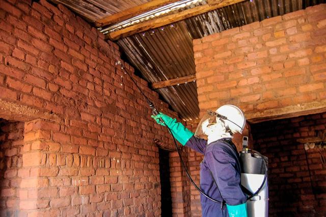 A home is sprayed to keep mosquitoes away. ‘We used to have lots of malaria; we don’t anymore. I haven’t had malaria in 20 years,’ says Chief Mukuni. A home is sprayed to keep mosquitoes away. ‘We used to have lots of malaria; we don’t anymore. I haven’t had malaria in 20 years,’ says Chief Mukuni.