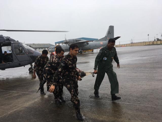 Army personnel bring a fisherman rescued from sea. (HT PHOTO) Army personnel bring a fisherman rescued from sea. (HT PHOTO)