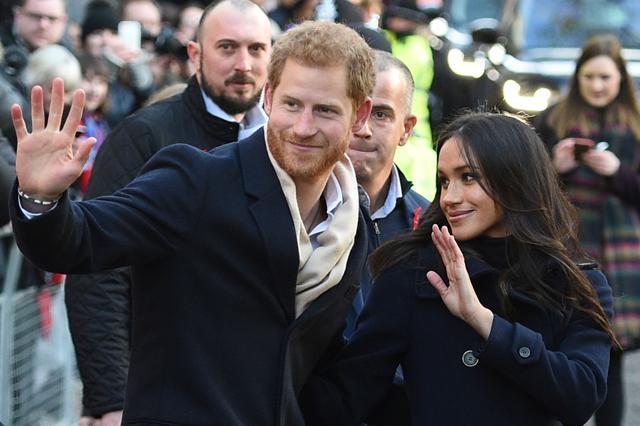 Britain's Prince Harry and his fiancee US actress Meghan Markle greet wellwishers on a walkabout as they arrive for an engagement at Nottingham Contemporary in Nottingham, central England, on December 1. (AFP Photo) Britain's Prince Harry and his fiancee US actress Meghan Markle greet wellwishers on a walkabout as they arrive for an engagement at Nottingham Contemporary in Nottingham, central England, on December 1. (AFP Photo)