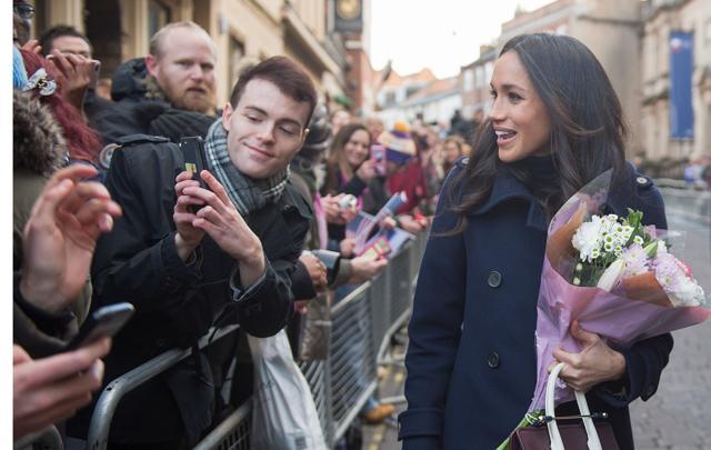 Britain's Prince Harry's fiancee US actress Meghan Markle greets wellwishers on a walkabout as they arrive for an engagement at Nottingham Contemporary in Nottingham on December 1. (AFP Photo) Britain's Prince Harry's fiancee US actress Meghan Markle greets wellwishers on a walkabout as they arrive for an engagement at Nottingham Contemporary in Nottingham on December 1. (AFP Photo)