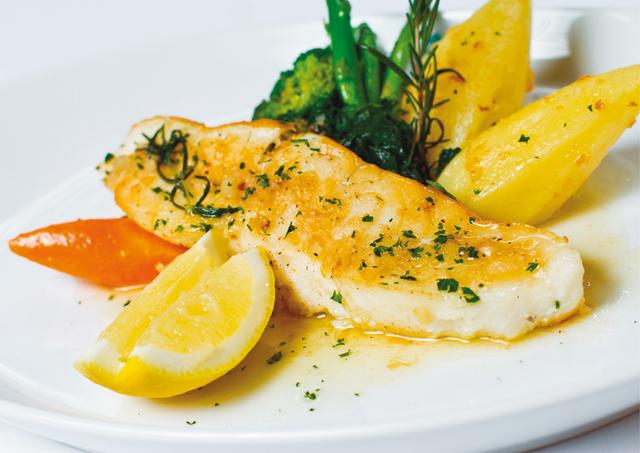 Melted butter on a piece of grilled fish with some lemon makes for a yummy dish (Shutterstock) Melted butter on a piece of grilled fish with some lemon makes for a yummy dish (Shutterstock)