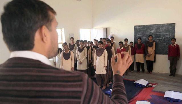 Teachers take extra classes on holidays for students of Class 9, 10 and 11 during which class tests, revision and clarification of doubts take place. (HT Photo/Himanshu Vyas) Teachers take extra classes on holidays for students of Class 9, 10 and 11 during which class tests, revision and clarification of doubts take place. (HT Photo/Himanshu Vyas)