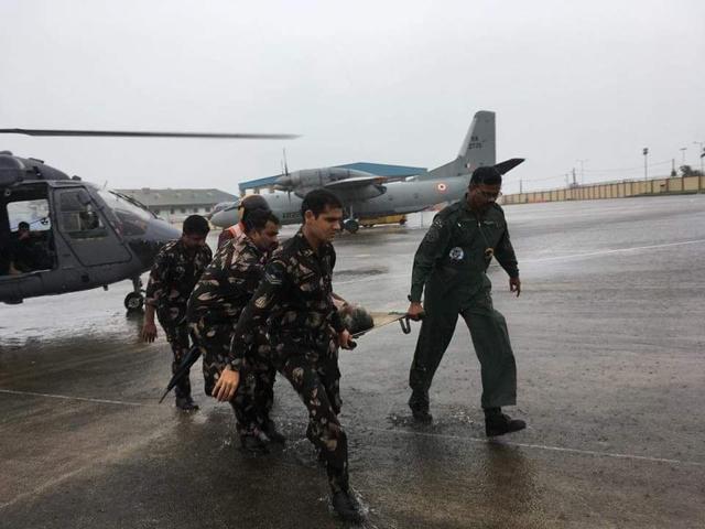 Air force personnel bring in survivors for treatment. (Handout by Defence ministry) Air force personnel bring in survivors for treatment. (Handout by Defence ministry)