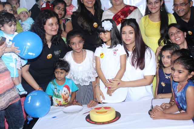 Aishwarya Rai Bachchan along with her mother Brindya Rai, daughter Aaradhya Bachchan and children born with cleft lips and palates of Smile Train. (IANS) Aishwarya Rai Bachchan along with her mother Brindya Rai, daughter Aaradhya Bachchan and children born with cleft lips and palates of Smile Train. (IANS)