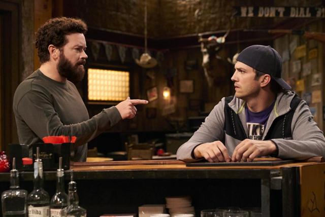 Danny Masterson in a still from the Ranch, with Ashton Kutcher (R).
