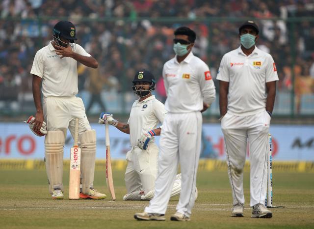 While the Sri Lankan players wore masks during the Kotla Test to protect them from the toxic smog, Indian players seemed to be quite at ease. (AFP) While the Sri Lankan players wore masks during the Kotla Test to protect them from the toxic smog, Indian players seemed to be quite at ease. (AFP)