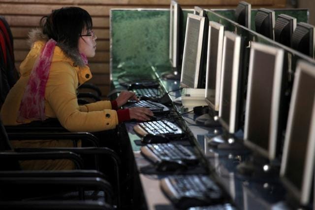 A woman uses a computer in an internet cafe at the centre of Shanghai, China January 13, 2010. (Reuters) A woman uses a computer in an internet cafe at the centre of Shanghai, China January 13, 2010. (Reuters)