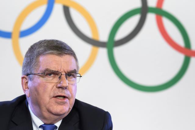 International Olympic Committee (IOC) president Thomas Bach attends a press conference following an executive meeting on Russian doping, on December 5, 2017 in Lausanne. (AFP) International Olympic Committee (IOC) president Thomas Bach attends a press conference following an executive meeting on Russian doping, on December 5, 2017 in Lausanne. (AFP)