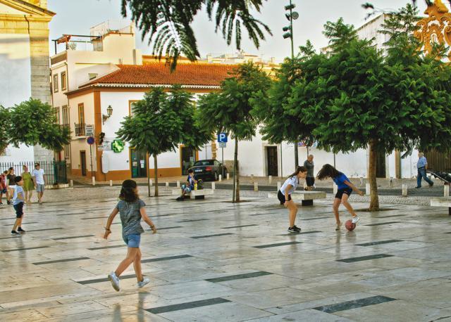 Girls play football at a plaza in Tavira, Portugal (Saubhadra Chatterji) Girls play football at a plaza in Tavira, Portugal (Saubhadra Chatterji)
