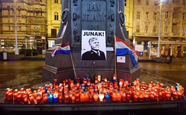 Lit candles and flags are placed in tribute to General Slobodan Praljak in Zagreb on November 30, 2017. (AFP) Lit candles and flags are placed in tribute to General Slobodan Praljak in Zagreb on November 30, 2017. (AFP)