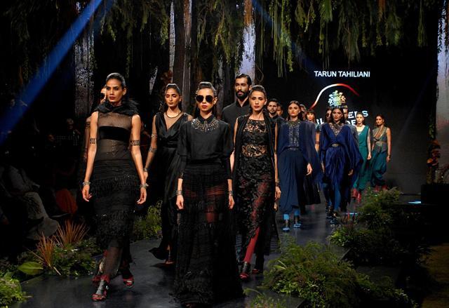 Models showcase creations by designer Tarun Tahiliani at the Blenders Pride Fashion Tour 2017. (AFP) Models showcase creations by designer Tarun Tahiliani at the Blenders Pride Fashion Tour 2017. (AFP)