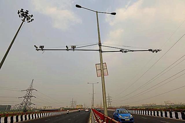 The four CCTV cameras equipped with automatic number plate recognition (ANPR) on the elevated road. (HT File Photo) The four CCTV cameras equipped with automatic number plate recognition (ANPR) on the elevated road. (HT File Photo)