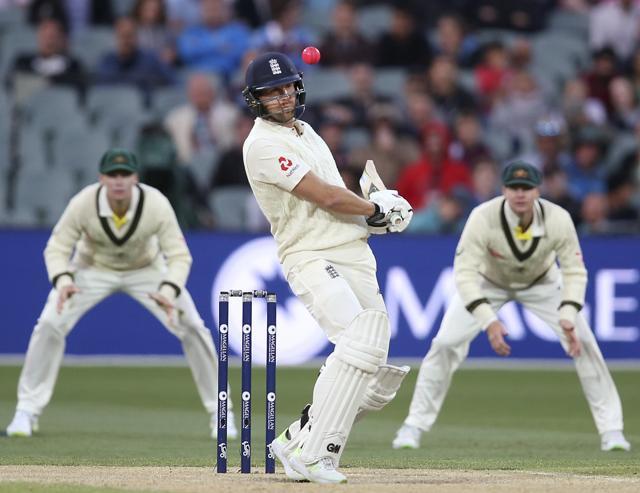 England's Dawid Malan swerves away from a delivery from Australia's Pat Cummins during the fourth day of their Ashes cricket Test match in Adelaide, Tuesday, Dec. 5, 2017. (AP) England's Dawid Malan swerves away from a delivery from Australia's Pat Cummins during the fourth day of their Ashes cricket Test match in Adelaide, Tuesday, Dec. 5, 2017. (AP)