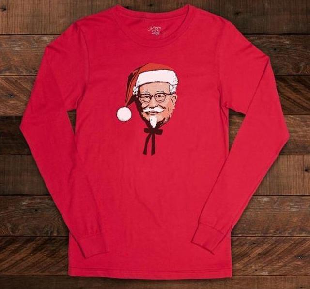 The collection includes KFC’s answer to the ugly holiday sweater -- a long-sleeved red t-shirt featuring the brand’s famous Colonel Santa motif, who is, naturally, wearing a Santa hat. (KFC)