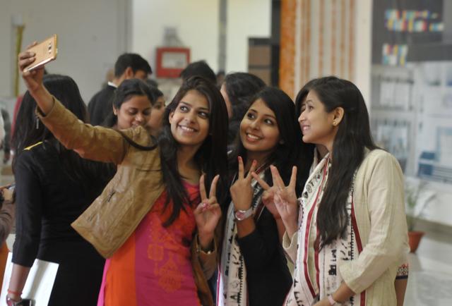 Capturing the moment: Students at the convocation. (HT Photo) Capturing the moment: Students at the convocation. (HT Photo)