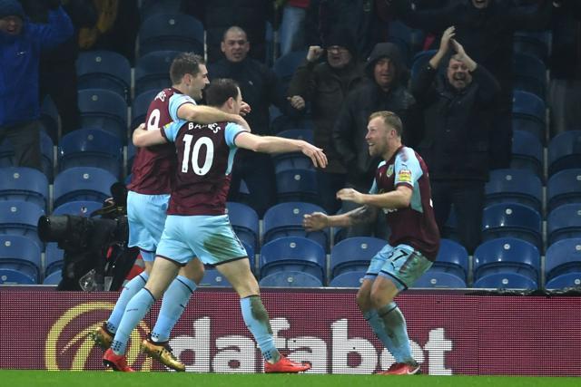 Burnley's English striker Ashley Barnes (2L) celebrates after scoring against Stoke City. (AFP) Burnley's English striker Ashley Barnes (2L) celebrates after scoring against Stoke City. (AFP)