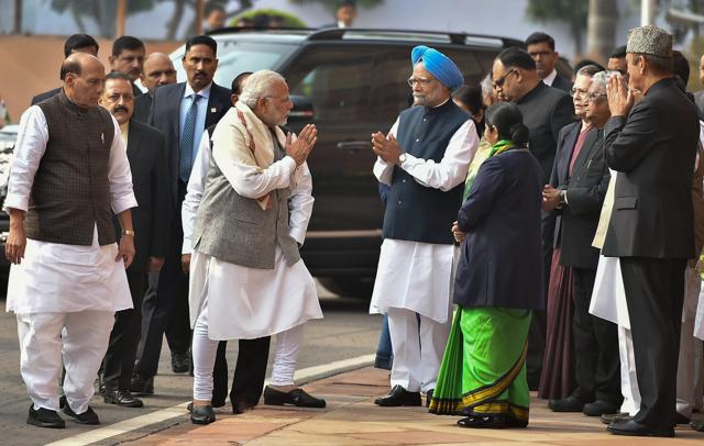 Prime Minister Narendra Modi greets former PM Manmohan Singh, as home minister Rajnath Singh, Congress president Sonia Gandhi and other dignitaries look on during a ceremony for the martyrs of the 2001 Parliament attack at Parliament House in New Delhi on Wednesday. (PTI) Prime Minister Narendra Modi greets former PM Manmohan Singh, as home minister Rajnath Singh, Congress president Sonia Gandhi and other dignitaries look on during a ceremony for the martyrs of the 2001 Parliament attack at Parliament House in New Delhi on Wednesday. (PTI)