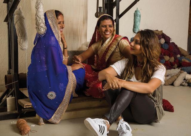Gauri shares a light moment with the women at Jaipur Rugs Gauri shares a light moment with the women at Jaipur Rugs