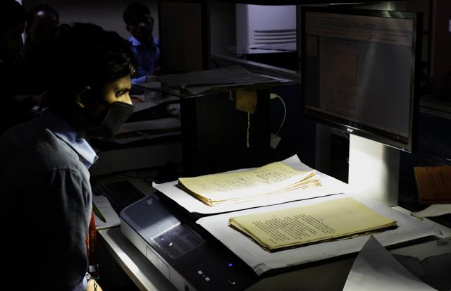 Documents being scanned for digitisation at Delhi archives. (Vipin Kumar/HT PHOTO) Documents being scanned for digitisation at Delhi archives. (Vipin Kumar/HT PHOTO)