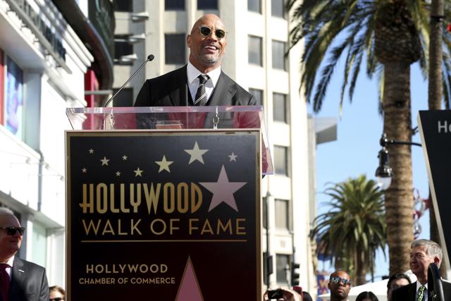 Dwayne Johnson speaks at a ceremony honouring him with a star on the Hollywood Walk of Fame on Wednesday. (Willy Sanjuan/Invision/AP) Dwayne Johnson speaks at a ceremony honouring him with a star on the Hollywood Walk of Fame on Wednesday. (Willy Sanjuan/Invision/AP)