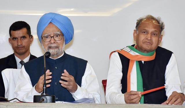 Former prime minister and Congress leader Manmohan Singh and Ashok Gehlot address a press conference in Surat. (PTI File Photo) Former prime minister and Congress leader Manmohan Singh and Ashok Gehlot address a press conference in Surat. (PTI File Photo)