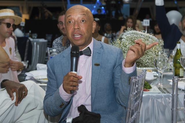 Def Jam Records mogul Russell Simmons speaks at the 2016 Art For Life Benefit. (Scott Roth/Invision/AP) Def Jam Records mogul Russell Simmons speaks at the 2016 Art For Life Benefit. (Scott Roth/Invision/AP)