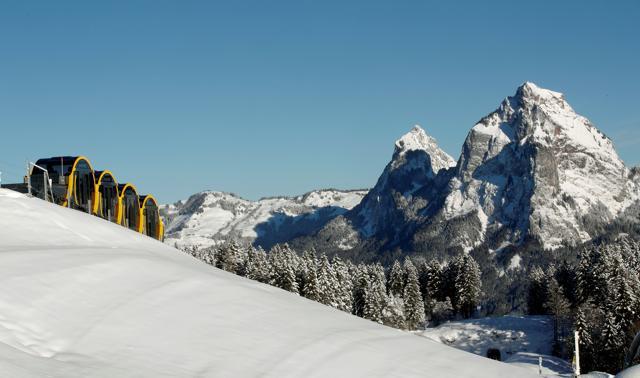 The barrel-shaped carriages of a new funicular line are seen front of mount Grosser Mythen. (Reuters Photo) The barrel-shaped carriages of a new funicular line are seen front of mount Grosser Mythen. (Reuters Photo)