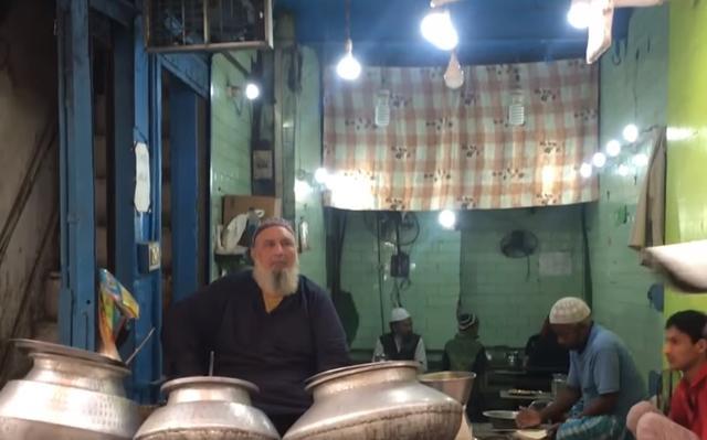 Haji Mohammed Anwar looks a bit like a pehelwan too. He sits in pristine white clothes, presiding over his small shop at Haveli Azam Khan in Chitli Qabar Chowk. (HT file photo )