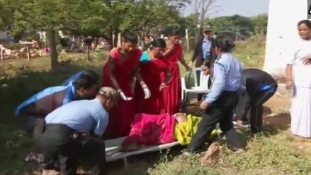 The woman being taken to hospital after she gave birth to a baby near a drain in Odisha’s Koraput hospital. (ANI) The woman being taken to hospital after she gave birth to a baby near a drain in Odisha’s Koraput hospital. (ANI)