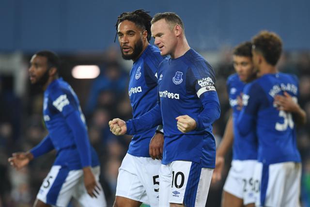 Everton's English striker Wayne Rooney (C) celebrates after scoring the penalty. (AFP) Everton's English striker Wayne Rooney (C) celebrates after scoring the penalty. (AFP)