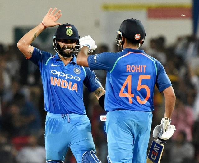 Rohit Sharma being congratulate by Virat Kohli after completing his century during the 5th ODI against Australia at Vidarbha Cricket Association Stadium, Jamtha, Nagpur on October 1, 2017. (PTI)