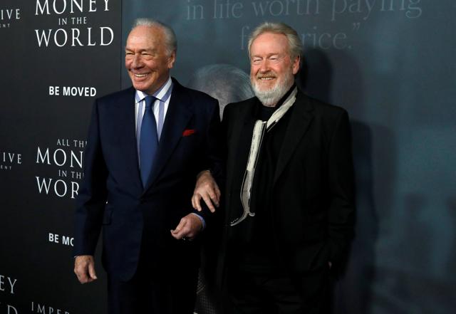 Director Ridley Scott (R) and Christopher Plummer pose at the premiere for All the Money in the World in Beverly Hills, California. (REUTERS)