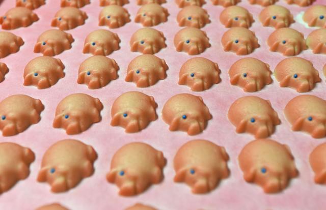 Pigs made of fresh marzipan. (AFP) Pigs made of fresh marzipan. (AFP)
