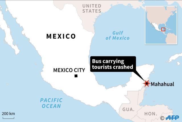 A bus carrying tourists from a US cruise ship to an archeological site in Mexico crashed Tuesday. (AFP) A bus carrying tourists from a US cruise ship to an archeological site in Mexico crashed Tuesday. (AFP)