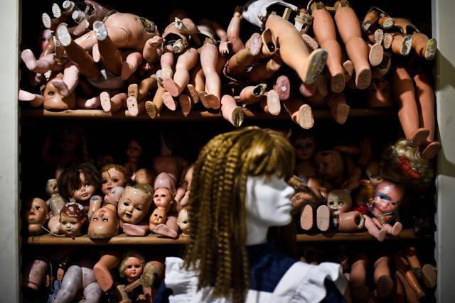 A mannequin is displayed in front of shelves of doll parts. (AFP) A mannequin is displayed in front of shelves of doll parts. (AFP)