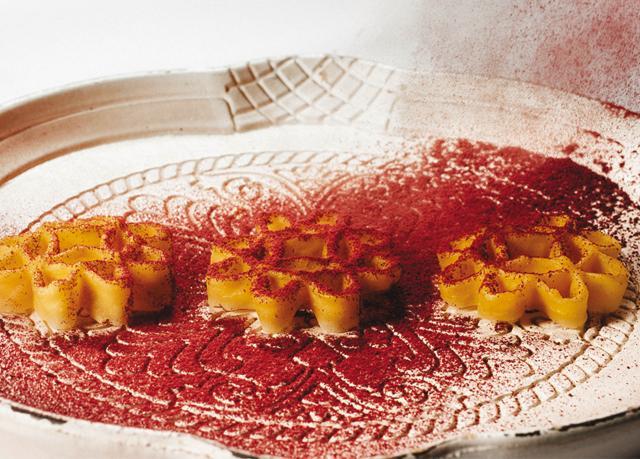 Goat brain flower power dish at Gaggan Bangkok. The kitchen of the restaurant is fully international with 23 nationalities Goat brain flower power dish at Gaggan Bangkok. The kitchen of the restaurant is fully international with 23 nationalities