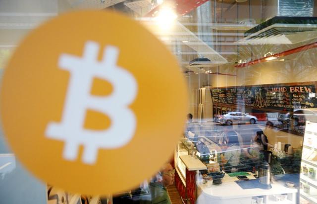 A view of Ducatus cafe, the first cashless cafe that accepts cryptocurrencies such as Bitcoin, on their opening day in Singapore December 21. (REUTERS) A view of Ducatus cafe, the first cashless cafe that accepts cryptocurrencies such as Bitcoin, on their opening day in Singapore December 21. (REUTERS)