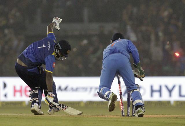 MS Dhoni stumps out Sri Lanka's Thisara Perera during their first T20 international cricket match in Cuttack on Dec. 20, 2017. (AP)